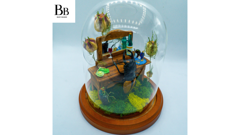 insect diorama with miniature book the beetles dilemma